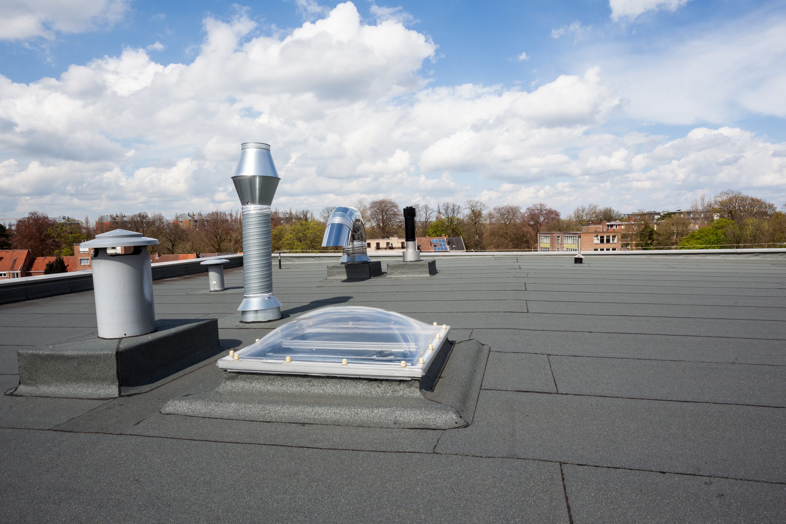 Inox,Chimney,On,The,Flat,Roof,In,The,City